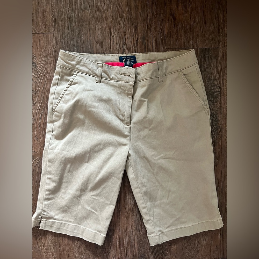 Size 9/10 Bermuda khaki shorts by Austin clothing company.  (Academy brand)